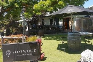 a house with trees in the background