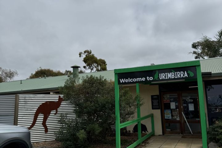 Entrance to Urimbirra park with kangaroo silhouette and greenery.